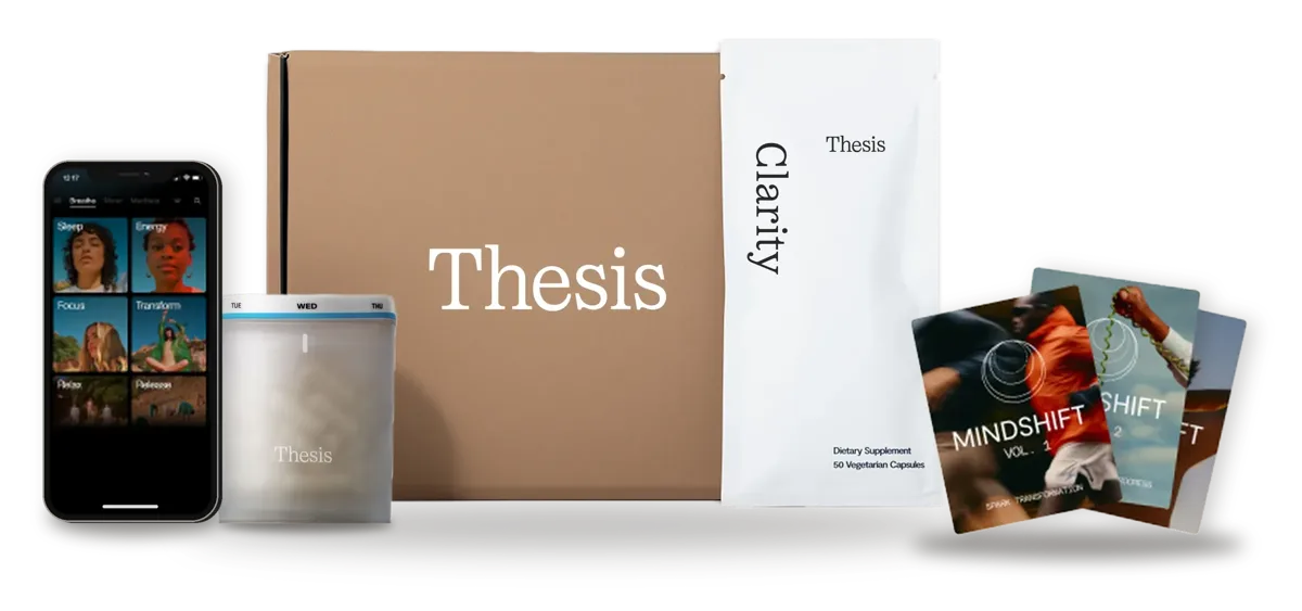 The Clarity Welcome Kit: the Open breathwork app, the frosted glass jar, the Thesis box, a Clarity pouch and the Mindshift habit reset cards